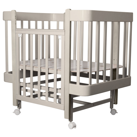 Кровать детская "Indigo "Tiny" (ложе 100*70, закругленные углы, продольный маятник+колеса)IN-08